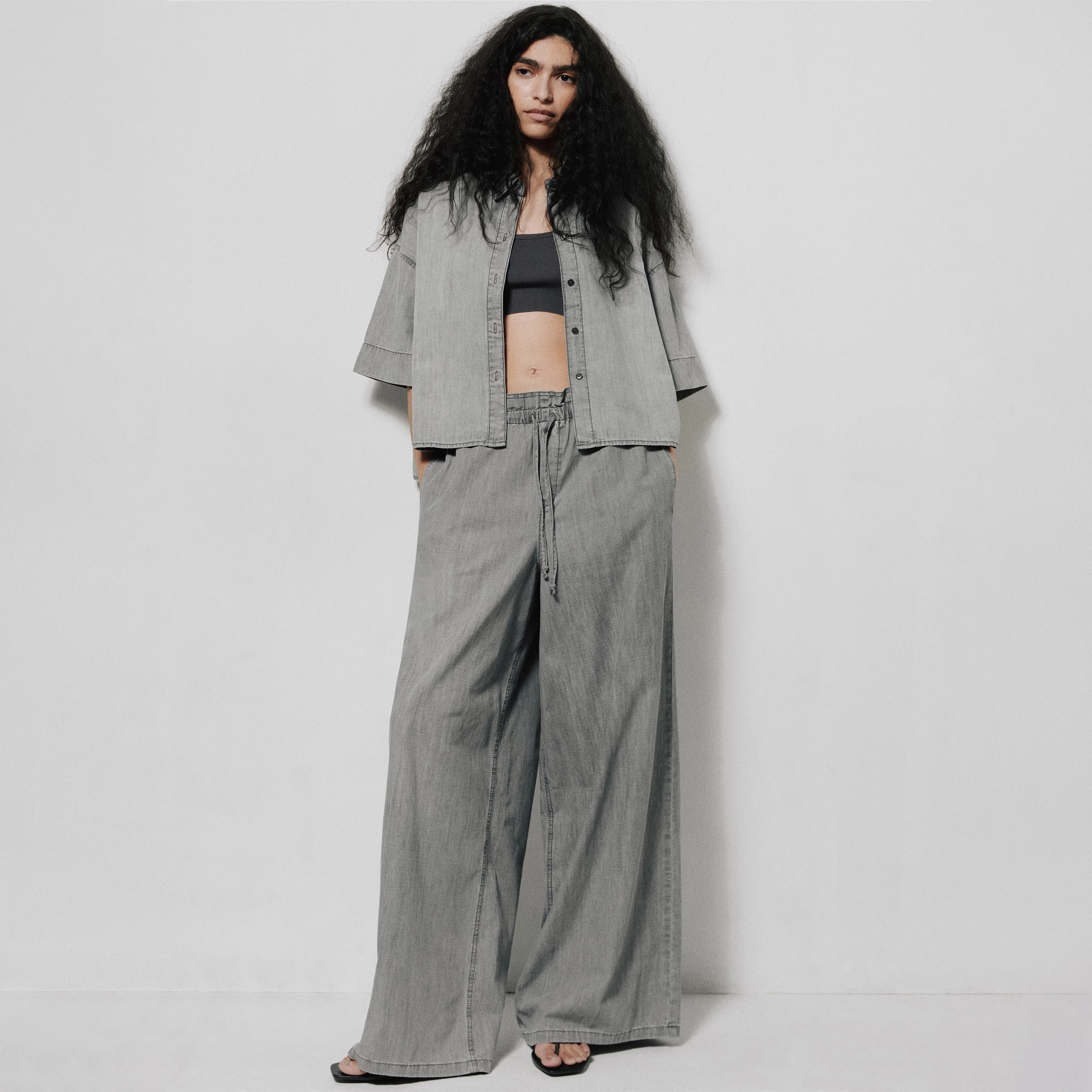 DWINDLE - Paperbag denim trousers in pure cotton - women - grey