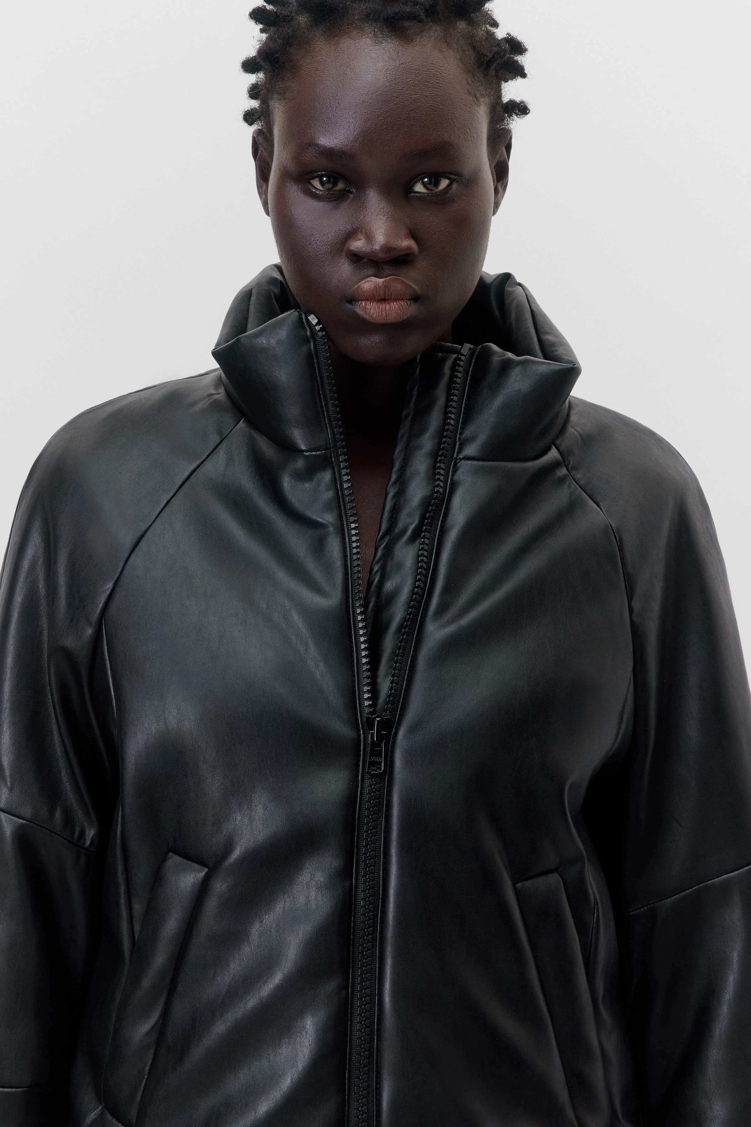 TRURO - puffer jacket in leather look - women - black - Seitenansicht