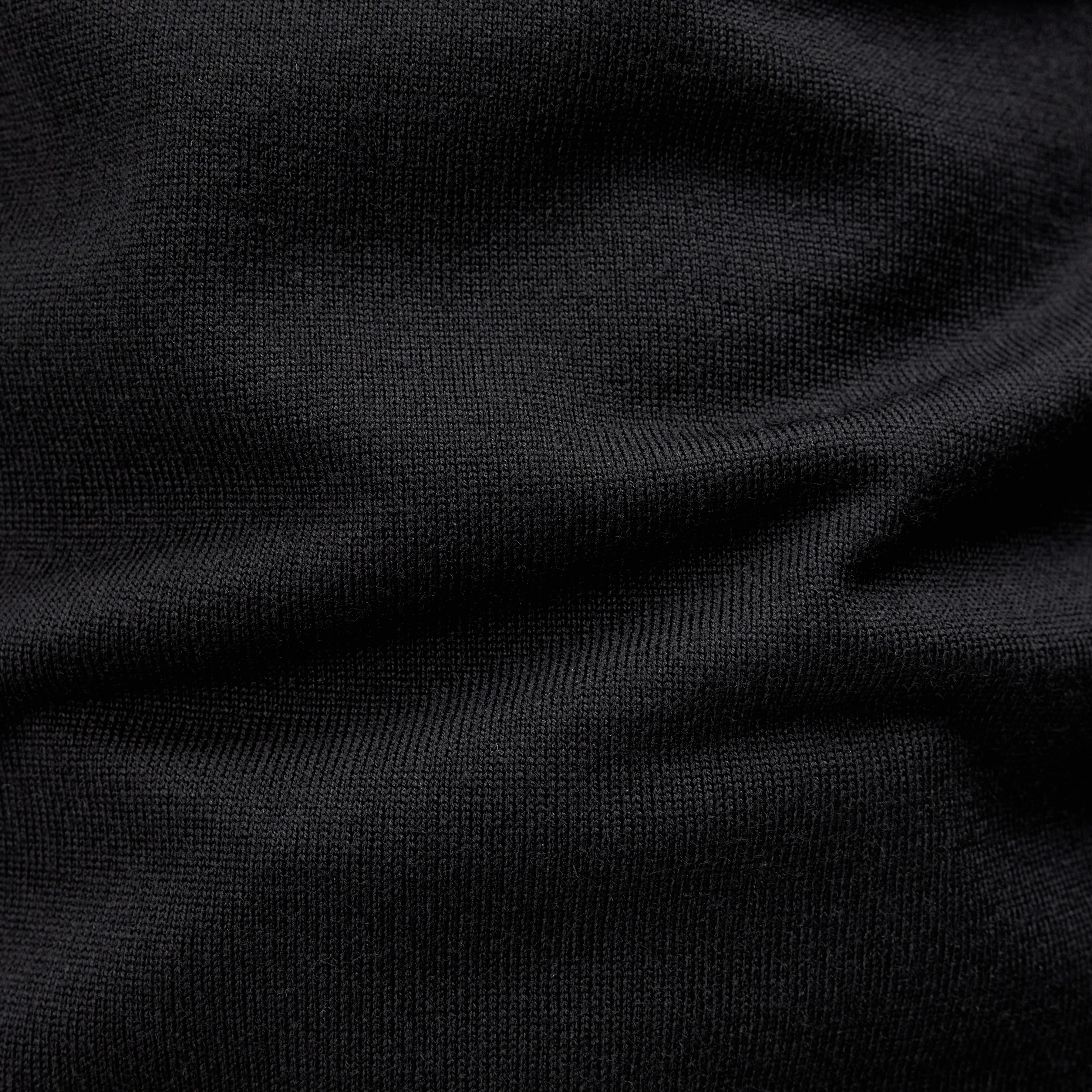 JOEY - Turtleneck jumper in 100% merino wool - men - black - Materialbild (B2C)