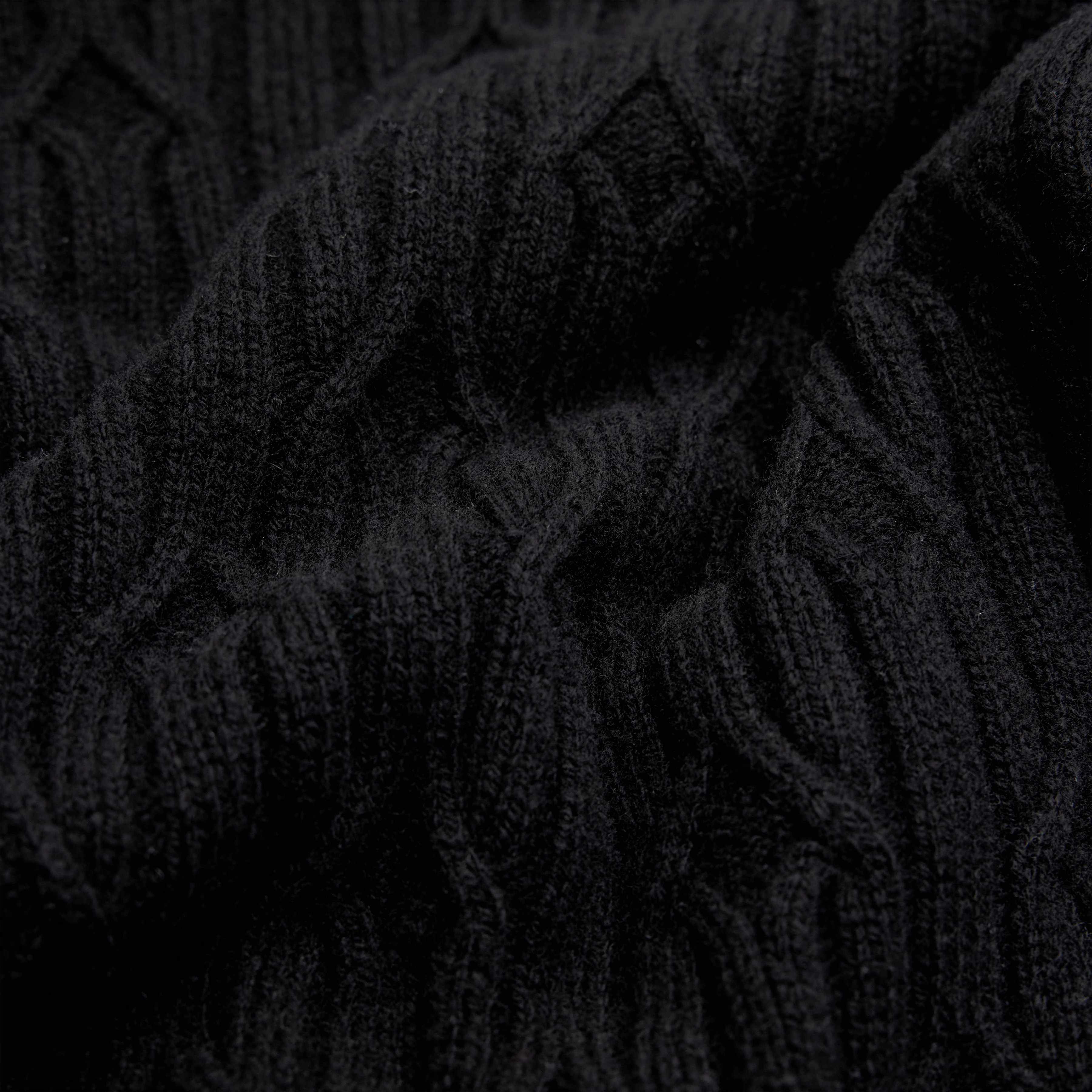 ELSTERI - Strickkleid in Minilänge in Schurwolle - Damen - schwarz - Materialbild (B2C)