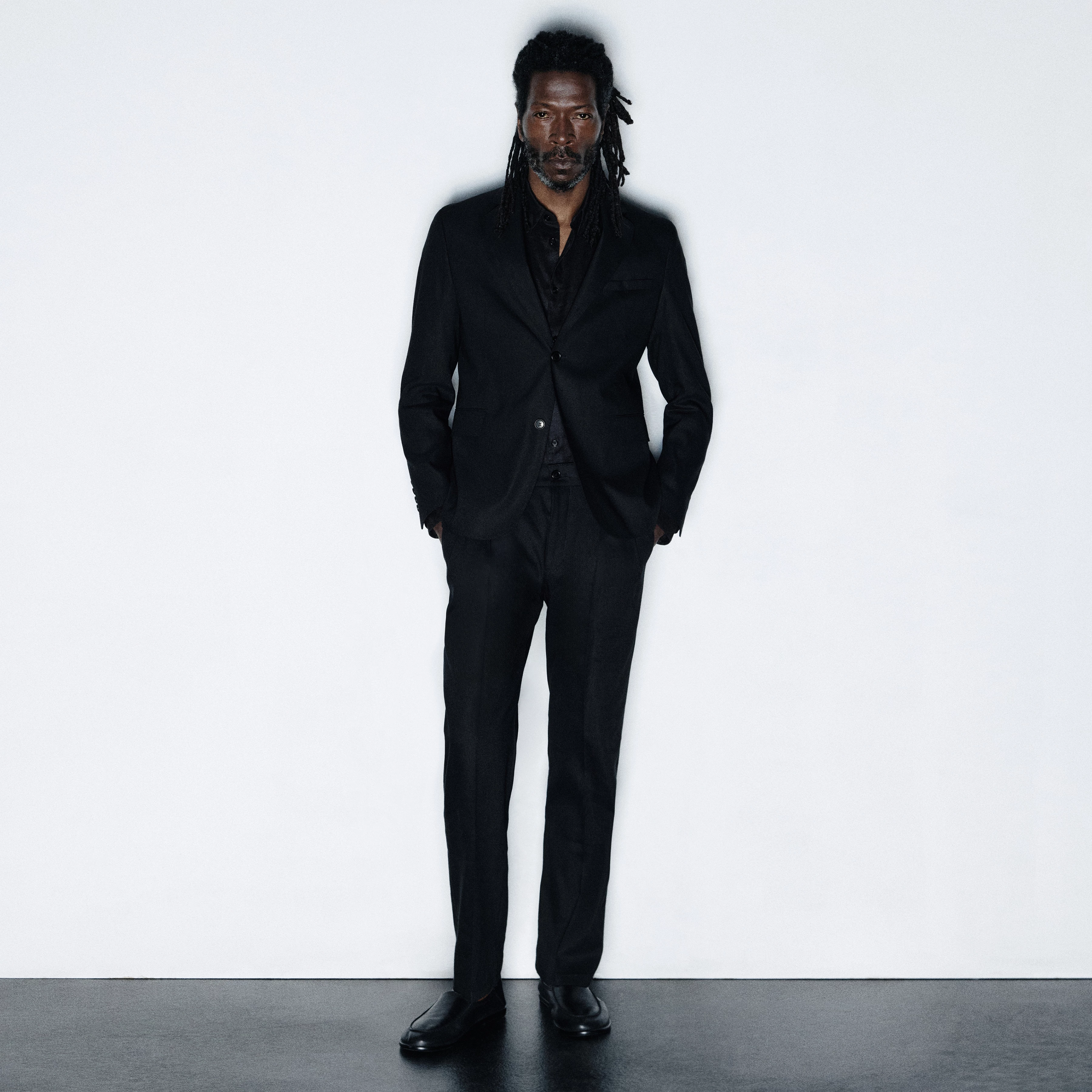 LEEK - Relaxed-fit pleated trousers in blended linen - men - black