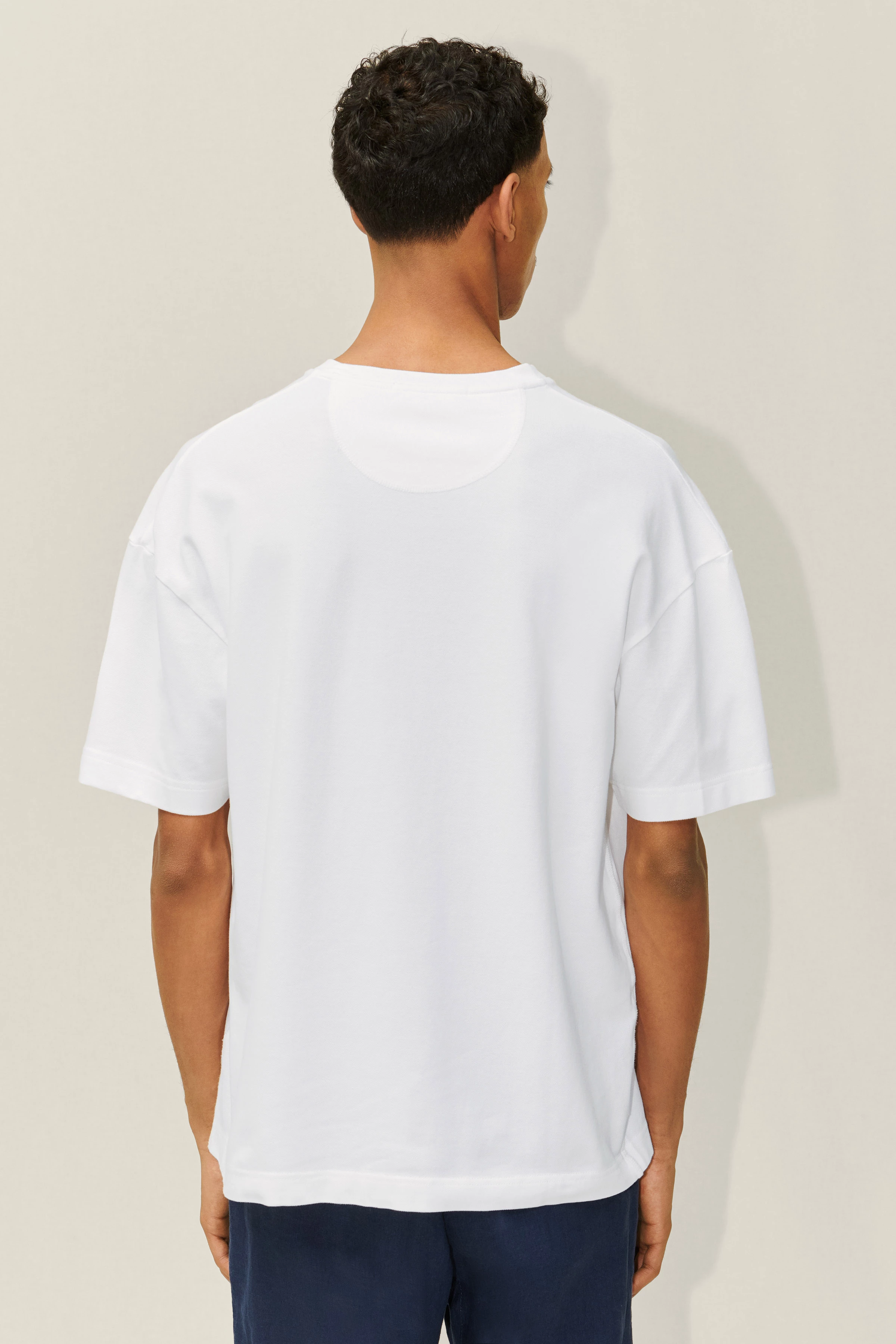 TOMMY - T-Shirt aus Baumwoll-Piqué - Herren - weiß - Rückansicht