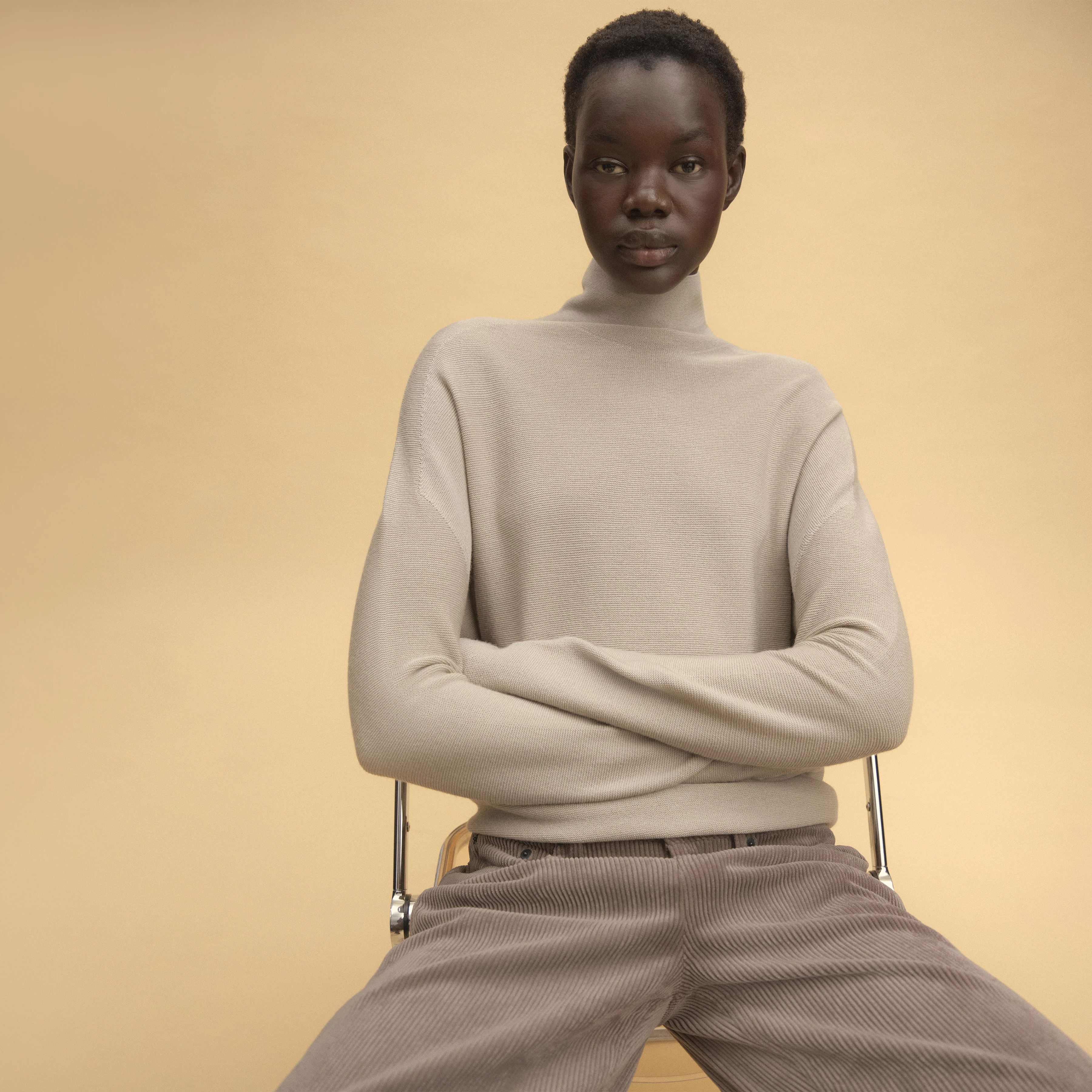 LIORA - Egg-shaped turtleneck jumper in 100% merino wool - women - beige