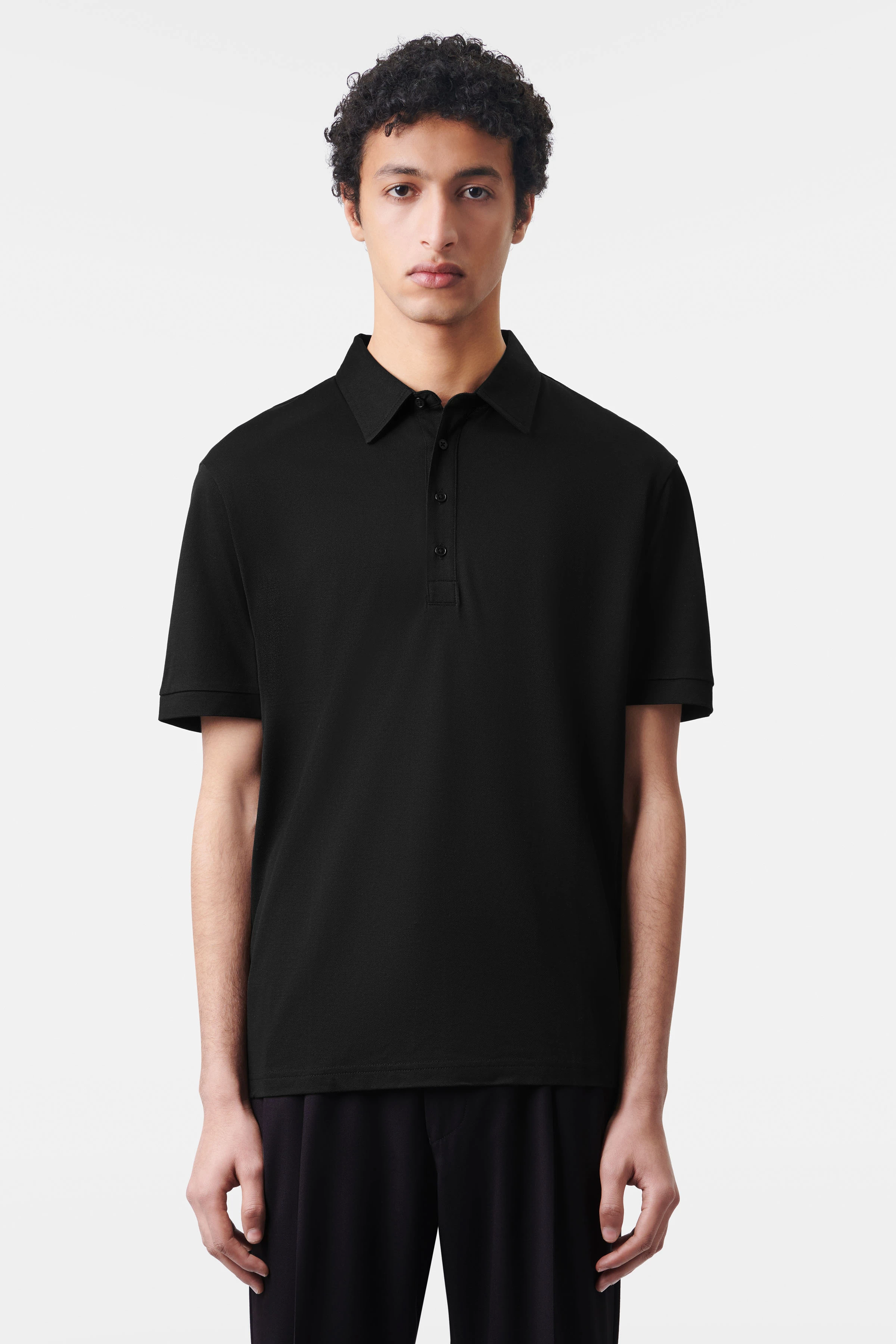 GARRY - 4-knoops polo met omgeslagen kraag in piqué - heren - zwart - Frontansicht