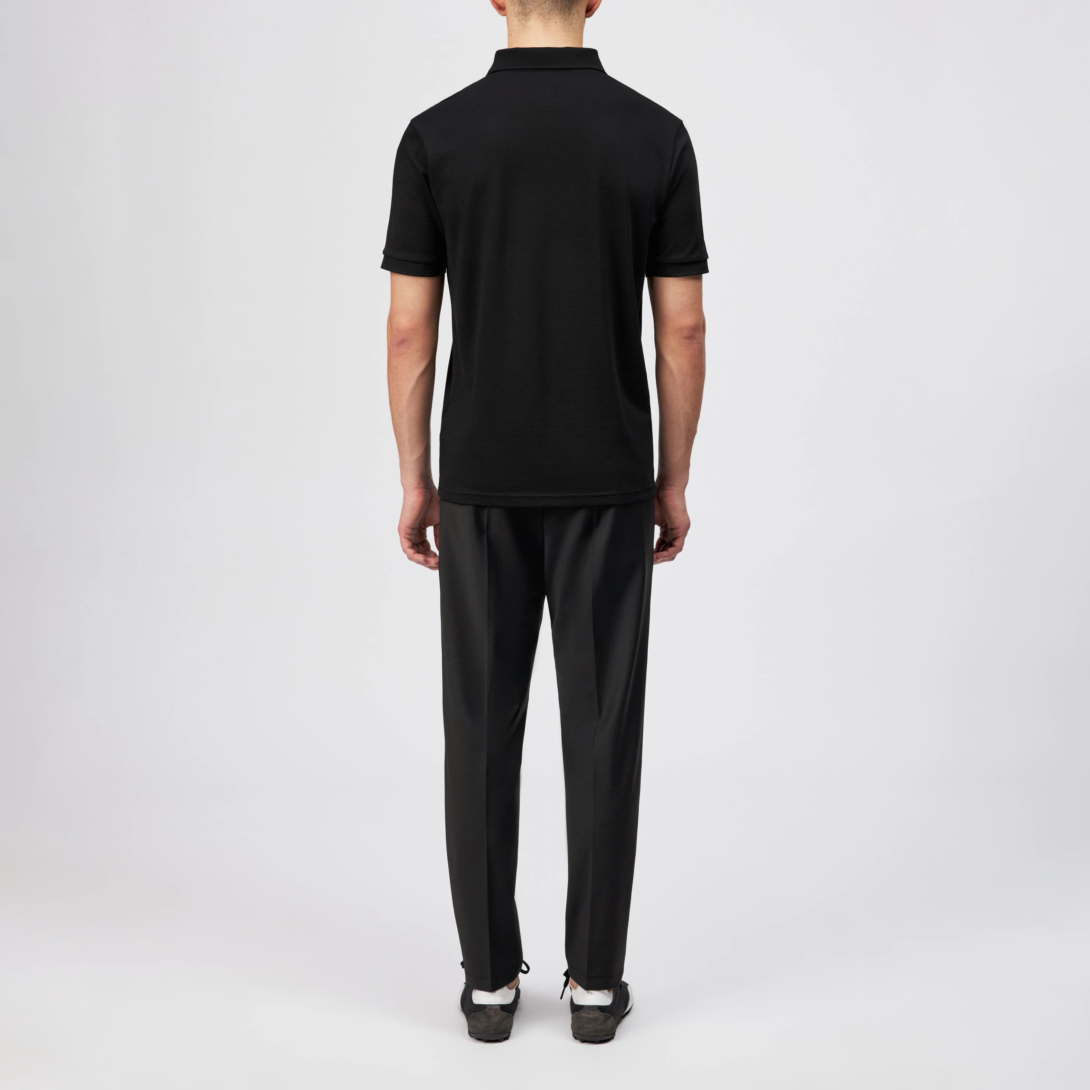 SANTOS - Classic regular fit polo in piqué structure - men - black - Rückansicht