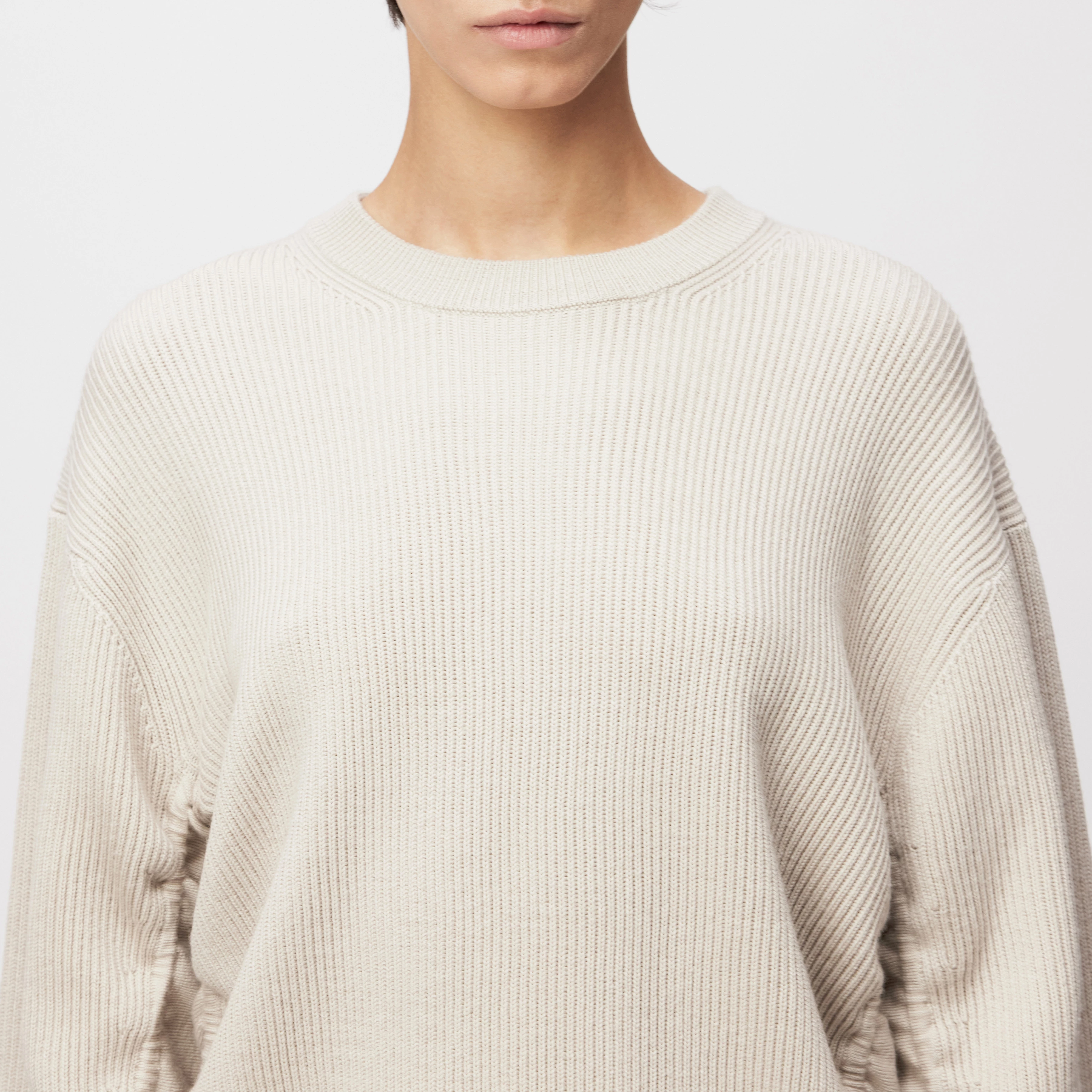 KEBEDI - Jumper with ruffles in 100% merino wool - women - beige - Detailansicht am Model