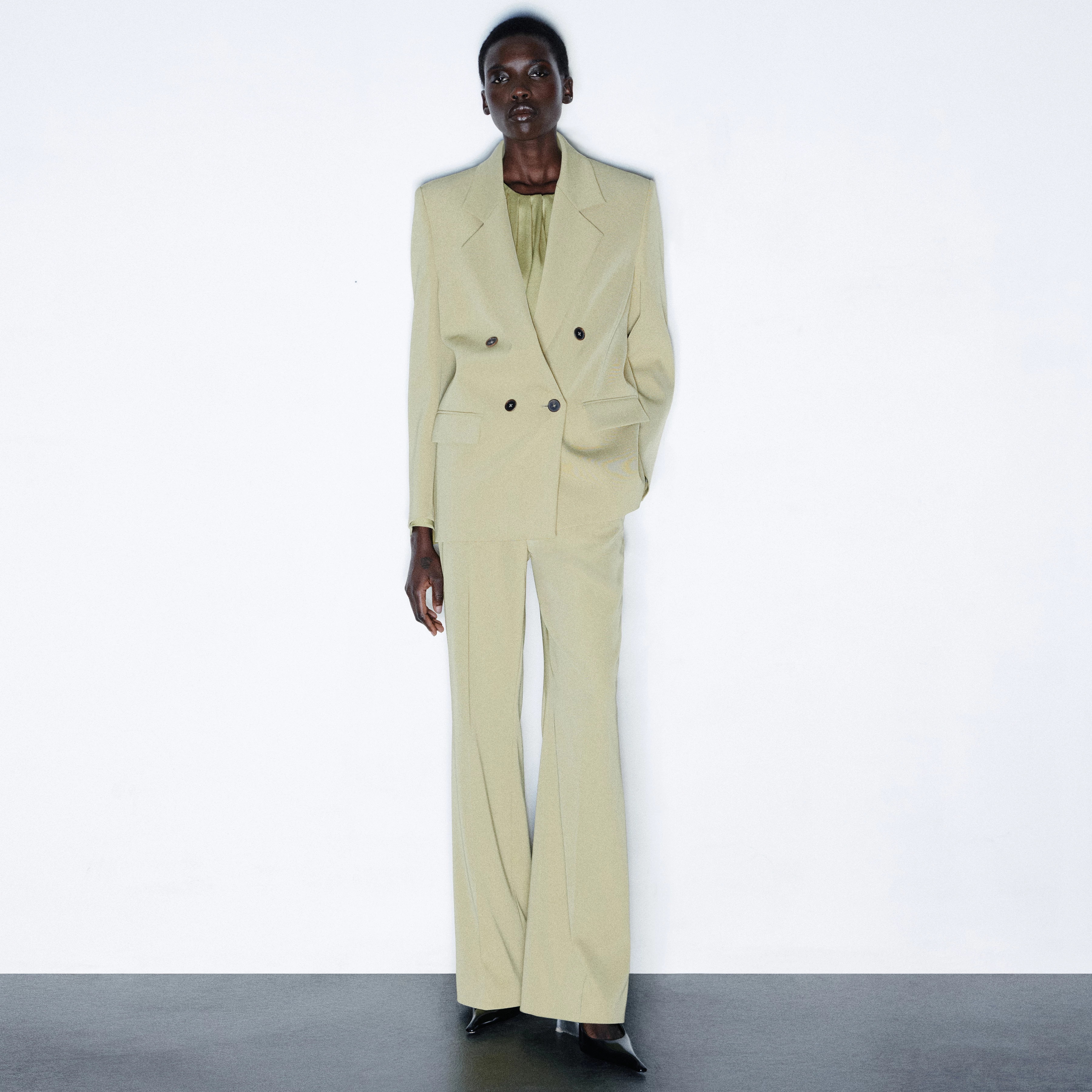 ARGUE - Techno-twill flared trousers - women - brown